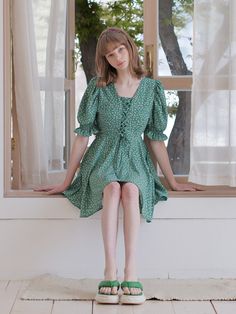 Editor's NotesDaisy Puff Dress GREEN from AVANDRESS is a dress product made of fabric with a daisy pattern. It has a string detail on the front. The back of the dress has a zip closure.- Puff sleeves- String details- Zipper detail- High quality stitchesMeasurements (in.)- S / M- Length: 31.8 / 32.2 in.- Shoulder: 12.9 / 13.3 in.- Chest: 16.9 / 17.9 in.- Sleeve: 12.5 / 12.9 in.*Model InformationModel 1- Height: 5'6 Top: S Bottom: MModel 2- Height: 5'6 Top: S Bottom: MComposition & Care- 100% Green Knee-length Sundress, Green Floral Mini Dress With Ruffles, Fitted Green Puff Sleeve Dress With Floral Print, Green Square Neck Puff Sleeve Dress For Spring, Green Fitted Puff Sleeve Dress For Garden Party, Fitted Green Puff Sleeve Dress For Garden Party, Green Puff Sleeve Knee-length Dress For Summer, Green Knee-length Puff Sleeve Summer Dress, Fitted Green Sundress With Square Neck