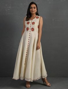 A double-layered umbrella cut front open Chanderi kurta with all-over floral buttis in yoke made using beads, sequins and silk French knots. Beadwork runs along the neckline and armhole. Contrast buttons and scalloped edges embroidered double layered flared hemline. The kurta comes with a delicate chanderi dupatta with all over sequence work and a wide woven zari border at the hem. Kurta measurements (in Inches): Size S: Bust - 38", Waist - 35", Length: 52" Size M: Bust - 40", Waist - 37", Lengt