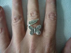 I handcrafted this ring using a silver plated butterfly, a vintage silver plated over brass open ring base and a silver plated leaf. The ring is adjustable and the parts are soldered.. It comes in a gift box. Extra little GIFT included separately with the packaging! Please contact me for any questions or alterations. I will be more than happy to help you. An animal ring ideal to be given as a personalized gift to friends, family and all those you wish to pleasantly surprise! More Rings selection Handmade Silver Adjustable Butterfly Ring, Handmade Silver Butterfly Open Ring, Adjustable Silver Butterfly Ring, Silver Butterfly Ring, Animal Ring, Animal Rings, Butterfly Ring, Silver Butterfly, Open Ring