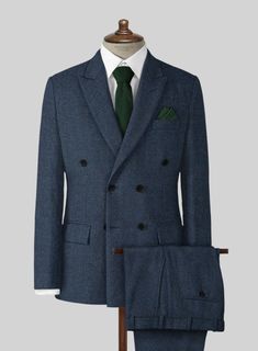 A classic go-to for any professional wardrobe, our Showman Blue Herringbone Tweed Double Breasted  Suit with a natural, timeless finish is bound to impress for any occasion. Crafted from wool, the suit is expertly designed in a herringbone weave that adds a touch of dimension to formal wear with its visible texture and lines, ideal for all formal events. Pair this modern suit with a white shirt and polished brogue shoes.   Look Includes  Showman Blue Herringbone Tweed Fabric  Double Breasted Jac Business Tweed Jacket With Herringbone Pattern, Classic Tweed Suit For Business Casual, Classic Tweed Business Casual Suit, Classic Wool Suits With Herringbone Pattern, Tailored Herringbone Pattern Suits, Classic Herringbone Suit For Semi-formal Occasions, Classic Semi-formal Suit With Herringbone Pattern, Wool Suits With Herringbone Pattern For Business Casual, Classic Semi-formal Herringbone Suit