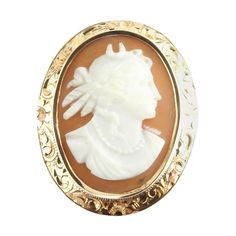 Vintage 10 Karat Yellow Gold Cameo Brooch This stunning cameo brooch features a lovely lady in profile framed in beautifully detailed 10K yellow gold. Size: 31 mm x 26 mm Weight: 3.2 dwt. / 5.1 gr. Stamped: Acid tested for 10K gold. Very good condition, professionally polished. Will come insured and packaged in a gift box. Cameo Jewelry, Victorian Gold, Vintage Cameo, Carved Shell, Cameo Brooch, Cameo Pendant, Gold Brooches, Pearl Brooch, Yellow Gold Pendants