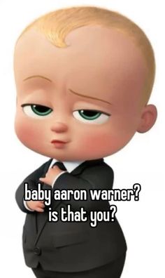 a baby wearing a suit and tie with the caption, what is that you?