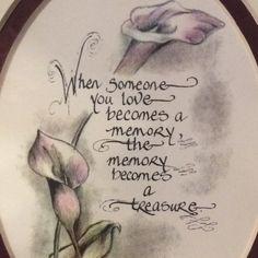 a ceramic plaque with an image of two flowers and the words, when someone you love becomes