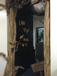 a door decorated to look like it has been torn open