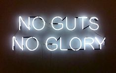 a neon sign that says no guts, no glory