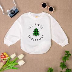 My First Christmas Romper Sweatshirt, Green Plaid Christmas Tree  Newborn Outfit, Holiday Infant Clothes, Winter Baby Gift, Baby Romper ⭐ Product Description: * Handmade with Care: Each romper is handcrafted with attention to detail. * Ships from the USA: Quick and reliable shipping from our U.S.-based workshop. * High-Quality Materials: Made from 100% CPSIA Compliant and ethically sourced fabric. The light fabric (5.0 oz/yd² or 170 g/m²) ensures comfort and durability. * Soft and Breathable: Crafted with soft, breathable fabric, this romper keeps your baby comfortable during both playtime and nap time. Featuring charming designs suitable for all babies, our romper is as adorable as it is practical. ⭐ Sizing Guide: Our products come in multiple sizes to fit growing babies from newborn to 2 White Tops For Christmas Birthday, White Top For Birthday In Winter, White Tops For Birthday And Winter, Green Plaid Christmas Tree, Green Plaid Christmas, Outfit Holiday, Christmas Romper, Infant Clothes, Plaid Christmas Tree