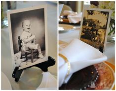 a baby sitting in a chair next to a table with plates and napkins on it