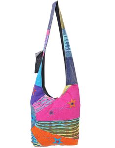 Tote your essentials in boho style with this bold cotton handbag that will add a splash of flash to multiple ensembles. Note: This one-of-a-kind item is handcrafted. Actual colors may be different than shown. Approximate Bag Size: 14" x 3.5" x 13"; Shoulder Strap Length: 22" Lined Interior with side pocket, Top zipper with button fastener 100% Cotton Hand Wash, Hang Dry Made in Nepal Cheap Multicolor Hobo Shoulder Bag, Cheap Everyday Multicolor Hobo Bag, Hippie Gifts, Cloth Purse, Hippie Purse, Embroidered Shoulder Bag, Boho Purse, Cotton Handbag, Large Crossbody Bags