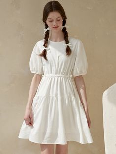 Editor's Notes The dress has puffs on shoulders and sleeves for a full, voluminous silhouette.- String at the waist- Pleated dress- Zipper at the backMeasurements(in.)ONE SIZE- Shoulder: 14.17 in.- Chest: 17.72 in.- Armhole: 8.86 in.- Sleeve: 10.24 in.- Waist: 16.73 in. *Model info: Arina - Height 5' 9'', Bust 14.96 in., Waist 11.81 in., Hips 17.32 in.Composition & Care- 50% Rayon, 36% Polyester, 14% Nylon- Dry cleaning recommended- Be careful of drying for special fabrics (ve Short Sleeve Dress With Gathered Sleeves And Voluminous Skirt, White Dress With Puff Sleeves And Voluminous Skirt, Dress With Gathered Short Sleeves And Voluminous Skirt, Dresses With Gathered Sleeves And Voluminous Skirt, White Voluminous Short Sleeve Dress, Voluminous Bubble Hem Dresses, Chic Puff Sleeve Dress With Voluminous Skirt, White Balloon Sleeve Dress With Elastic Sleeves, Puff Sleeve Ruffle Dress For Daywear