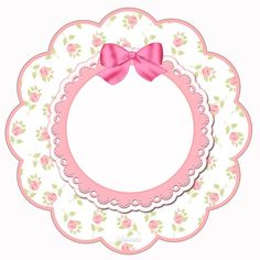 a paper plate with a pink bow on the top and flowers in the bottom half