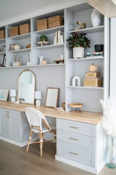 a white desk and chair in a room