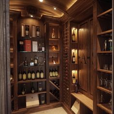 a wine cellar filled with lots of bottles