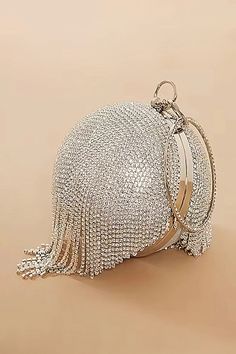 Sphere Shape Clutch Bag with Rhinestones and Tassel Wristlet - Elevate your style with this elegant sphere-shaped clutch bag featuring rhinestone embellishments and a tassel wristlet. Glamorous Evening Bags With Tassels, Glamorous Party Bags With Tassels, Elegant Evening Clutch With Tassels, Elegant Wedding Evening Bag With Tassels, Tassel Clutch Evening Bag For Party, Formal Clutch With Tassels, Elegant Bags With Tassels For Events, Elegant Tasseled Bag For Events, Formal Clutch Evening Bag With Tassels