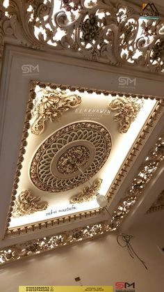 the ceiling is decorated with intricate designs