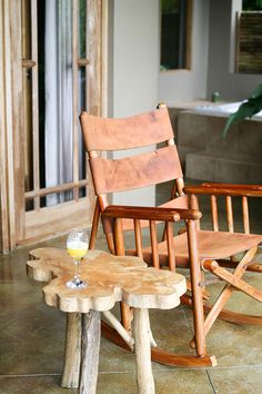 two wooden rocking chairs sitting next to each other