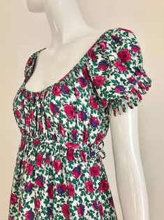 For Sale on 1stDibs - 1970s Pink, Green and Blue Rose Vibrant floral print cotton maxi dress. Empire waist with long sash that you can tie in the back or front. Perfect for Blue Rose, Green And Blue, Empire Waist, Pretty Things, Day Dresses