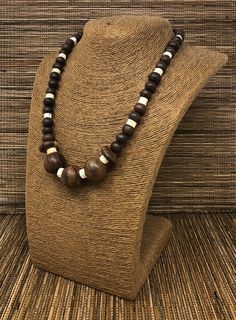 "Wooden Necklace. Beaded Necklace. Handmade with brown wooden beads Unisex Design. 20\" inches Around the Neck. Fits Most Sizes FAST SHIPPING! *First Class Mail Visit my Etsy Shop to see more Designs! Handmade Wooden Earrings, Wooden Bracelets and Necklaces. Click here to see more designs: https://www.etsy.com/shop/FreedomLifeStyle" Wooden Bead Jewelry, Wooden Bracelets, Brown Beaded Necklace, Hematite Jewelry, Moda Hippie, Earrings Wooden, Wooden Bead Necklaces, Botanical Earrings, Brown Earrings