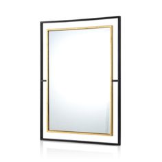 a black and gold framed mirror on a white wall