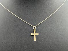 Vintage 14k Yellow Gold Small Cross and Necklace  Condition consistent with age and use. Please see photos for details. Antique Yellow Gold Necklaces With Hallmark, Antique Yellow Gold Diamond Cut Necklace, Classic Diamond Cut Crucifix Necklaces, Classic Diamond Cut Crucifix Necklace, Antique Cross Pendant Necklace For Formal Occasions, 14k Gold Crucifix Necklace For Formal Occasions, Antique Yellow Gold Crucifix Jewelry, Classic Cross Necklace For Formal Occasions, Formal Classic Cross Necklace