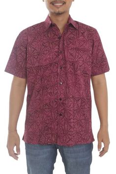 Shades of burgundy and salmon form a geometric pattern on this men's shirt from Indonesia. By artisan Agus Suryanto the cotton shirt features short sleeves and a button-down front. Short Sleeve Burgundy Tops For Summer, Burgundy Short Sleeve Tops For Summer, Summer Short Sleeve Shirt With Batik Print, Summer Short-sleeve Shirt With Batik Print, Casual Short Sleeve Batik Print Shirt, Relaxed Fit Short Sleeve Batik Print Top, Relaxed Fit Short Sleeve Batik Top, Relaxed Fit Short Sleeve Top With Batik Print, Relaxed Fit Batik Print Top With Short Sleeves