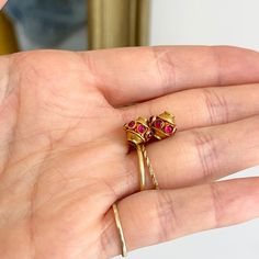 Estate/ vintage 18KT yellow gold ornate Indian Byzantine design earring charms with genuine rubies. Genuine, cabochon, rubies on each charm, bezel set. (7) rubies per charm Length: 10mm Width: 10mm Weight: 2.3 Grams per pair Not stamped, but tested and guaranteed 18KT No hoop earrings included Excellent used condition, may have never be used Yellow Gold Earrings With Charms Fine Jewelry, Yellow Gold Charm Earrings Fine Jewelry, Yellow Gold Earrings With Charms In Fine Jewelry Style, Single Ruby Earring As A Gift, Yellow Gold Ruby Dangle Jewelry, Gold Earrings With Ruby Birthstone, Gold Ruby Earrings With Birthstone, Red Byzantine Jewelry As Gift, Red Byzantine Style Jewelry Gift