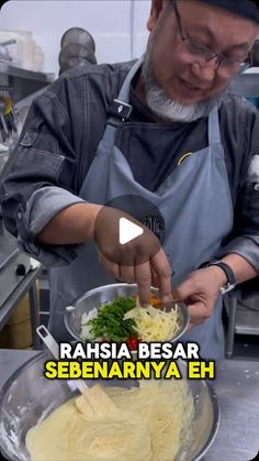 a man is preparing food in a kitchen