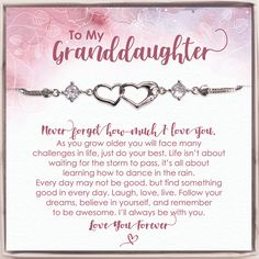 a granddaughter bracelet with two hearts on it