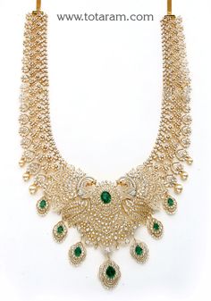 18 karat gold 'peacock - detachable / 2 in 1' diamond long necklace with color stones & culture pearls
  it can be used as a short necklace
  this product has inter changeable stones in the necklace 
    


introducing our exquisite 18 karat gold 'peacock - detachable / 2 in 1' diamond long necklace, a true masterpiece crafted with the finest attention to detail. this magnificent piece of jewelry is made in india, where skilled artisans have poured their heart and soul into creating a timeless w Elegant Diamond Necklace With Peacock Design, Elegant Yellow Gold Necklace With Peacock Design, Elegant Peacock Design Necklace For Reception, Elegant Peacock Necklace For Receptions, Formal Yellow Gold Jewelry With Peacock Design, Formal Yellow Gold Peacock-designed Jewelry, Formal Yellow Gold Peacock Jewelry, Elegant Green Bridal Necklace With Peacock Design, Elegant Peacock Design Jewelry For Reception