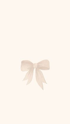 an image of a white bow on a light colored background that looks like something out of the sky