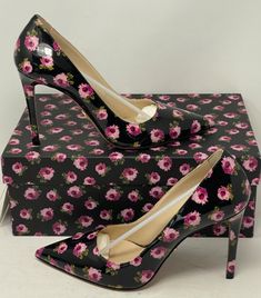 New with Box & Shoe Bags --  PRADA - Calzature Donna Patent Leather Pump Pointed Floral Rose Pumps  Nero Black Floral Rose Vernice Rose Size 8 US, 38 EU Style 1I834I *** PRADA Calzature Donna Floral Patent Leather Pump Pointed Toe Floral Rose Pumps 100MM - 4 Inch Heel $750 Color - Nero / Black / Rose Floral Group Name - Vernice Rose Style - 1I834I Women's Size US 8, 38 EU Details & Care Painterly blooms float in pinks and reds against the black ground of a glossy pointy-toe pump profiled with a towering stiletto and plunging topline. Heel style:  stiletto Toe style:  pointy toe, closed toe 4" (100mm) heel Leather upper, lining and sole Made in Italy All Sales Final -- No Returns. Item is Brand New with Original Box & Shoe Bags. All Sales Final -- No Returns. New with Box and shoe bag. Know Bags Prada, Prada Women, Black Ground, High Heels Shoes, Shoe Bags, Leather Floral, Rose Style, Patent Leather Pumps, 4 Inch Heels