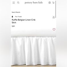 the bed skirt is white and has ruffles at the bottom, along with text that reads pottery barn kids