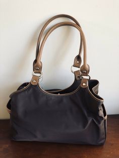 Nine West Brown Nylon & Faux Leather Handbag N-130815 Eye Catcher. Condition is New with tags. Shipped with USPS Priority Mail. Faux Leather Handbag, Leather Hobo Bag, Leather Hobo, Crafts To Do, Leather Handbag, Hobo Bag, Nine West, Priority Mail, Leather Handbags