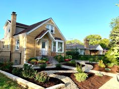 a house with landscaping in the front yard