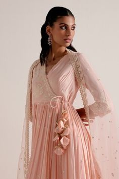 Blush pink tiered angarkha featuring thread and mirror embellishment with tassel detailing in the front. Comes with a sheer mirror and thread embellished dupatta. - Aza Fashions Spring Wedding Anarkali Set With Mirror Work, Spring Pink Choli With Dupatta, Spring Wedding Anarkali Set With Gota Work, Spring Wedding Dupatta With Mirror Work, Pink Long Sleeve Choli With Mirror Work, Pink Semi-stitched Dupatta With Tilla, Pink Mulmul Anarkali Set With Sheer Dupatta, Pink Bohemian Mulmul Dupatta, Semi-stitched Peach Dupatta With Cutdana Detail