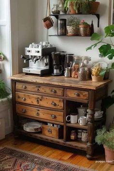 an old wooden dresser with pots and plants on it's shelf above the coffee maker