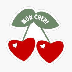 two cherries with the words mon cher on them sticker is shown in red and green