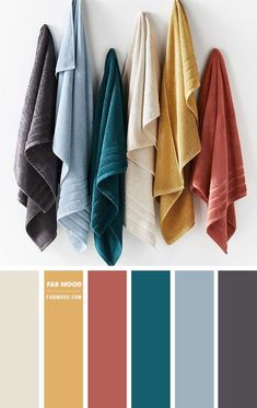 towels hanging on the wall with color swatches