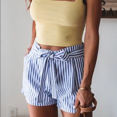 Sweet Linen Stripe Shorts For Your Spring Outfits! Tie Is Connected From The Back And You Tie Along The Front. These Casual Yet Chic Shorts Would Be Perfect For Warmer, Summer Days. Complete The Look With A White Bodysuit, Flat Mules, And A Light Cardigan. Model Is Wearing A Size Small A 2/4 M 6 L 8/10 Xl 12 Striped Tie Waist Bottoms For Summer, Blue Tie Waist Bottoms For Spring, Blue Bottoms With Tie Waist For Spring, Blue Tie Waist Shorts For Spring, Blue Shorts With Tie Waist For Spring, Casual Blue Bottoms With Tie Waist, Blue Bottoms With Tie Waist For Day Out, Blue Tie-waist Bottoms For Day Out, Blue Vacation Pants With Short Length