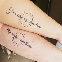 two people with tattoos on their arms that say you are my sunshine and my god's fortune