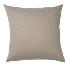 a beige pillow on a white background with a light colored linen material and contrasting colors