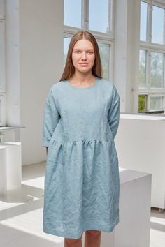 Soft linen smock dress with pockets and 3/4 sleeves. Simple and versatile look that will never get outdated!Handmade from washed and softened medium weight 100% linen.DESCRIPTION:-High quality European linen (OEKO-TEX certified);-Color in pictures: turquoise and peach (other colors please choose on the right);-Medium weight linen;-Not transparent;-Softened;-Doesn't shrink anymore;-No need to iron.SIZES:For perfect fit please send us your bust and hip measurements when ordering! We will make a ta Spring Dresses With Pockets And Half Sleeves, Casual Half-sleeve Dresses With Pockets, Daywear Tunic Dresses With Pockets, Spring Long Sleeve Linen Dress With Pockets, Tunic Dresses With Pockets For Daywear, Casual Midi Dress With 3/4 Sleeves And Pockets, Casual Midi Dress With Pockets And 3/4 Sleeves, Spring Lagenlook Dress With Pockets, Spring Oversized Dresses With Side Pockets