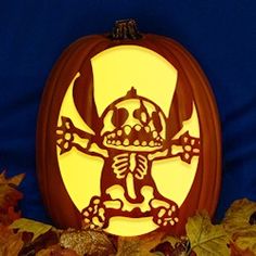 a carved pumpkin with a skeleton on it