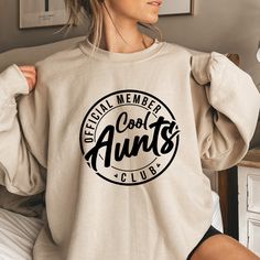 "Aunt Sweatshirt, Cool Aunts Club Sweatshirt, Aunt Gift, Aunt Birthday Gift, Sister Gifts, Auntie Sweatshirt, Aunt Sweatshirt, Cool Aunt Thank you so much for taking the time to browse my shop. Please feel free to reach out if you have any questions before or after purchasing.  💖 🎨Warning: On products with a print chart in the listing, metallic print colors are printed as matte.✨✌ We design and cut each graphic out with a soft touch, use matte vinyl and a heat press. The result will last for many washes. PRODUCT DESCRIPTION: Our sweatshirt are super comfortable and the quality is excellent, they are manufactured with cotton fibers to ensure comfort and durability. Polyester fibers are extremely strong, and resistant to most chemicals, along with shrinkage. 50% cotton, 50% polyester. The Auntie Aesthetic, Jordan Birthday, Auntie Sweatshirt, Auntie Life, Birthday Gift Sister, Aunt Birthday Gift, Cool Aunt, Aunt Birthday