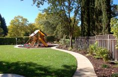 a playground in the middle of a yard