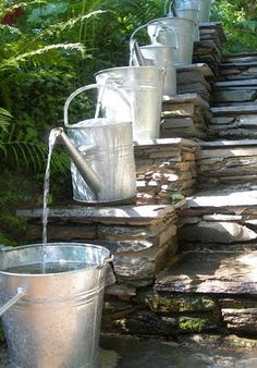 four different pictures show the steps and buckets used to pour water from welles