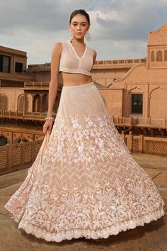 Peach attached cancan lehenga with linear, floral, chevron embroidery using pearls, beads, sequin and crystals work. Paired with a padded, linear embroidered blouse. Comes along with a jacket with floral, scallop, sequin embroidery. - Aza Fashions Chevron Embroidery, Cancan Lehenga, Sequin Embroidery, Sequins Embroidery, Embroidered Jacket, Set Women, Embroidered Blouse, Aza Fashion, Lehenga