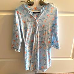 Nwot Lauren Ralph Lauren. Button Down Sleep Shirt. No Collar. Ruffled 3/4” Sleeve Length. Color Aqua Print. Purchased At Macys. 2 Avail. One Small And One Medium. Purchased Before A Procedure But Never Needed Or Worn. Has Been Washed Once In Tide Free And Clear Detergent. Purchased At Macy’s. Lovely Happy Floral Print Light Blue Background With Coral And Light Peach Flowers. 60% Cotton. 40% Rayon. Runs True To Size. Great Condition Never Worn Just Washed Why No Tags. Just Never Needed After Surg Blue Floral Print Long Sleeve Sleepwear, Spring Long Sleeve Sleepwear With Buttons, Blue Cotton Sleepwear With Buttons, Spring Sleepwear With Buttons And Long Sleeves, Long Sleeve Sleepwear With Buttons For Spring, Blue Cotton Sleepwear With Button Closure, Spring Sleepwear With 3/4 Sleeves, Casual Spring Sleepwear With 3/4 Sleeve, Casual 3/4 Sleeve Spring Sleepwear