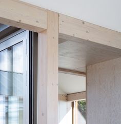 the inside of a house with wood framing