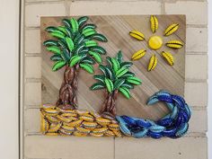 an art piece made out of plastic bananas and palm trees on a wood paneled wall