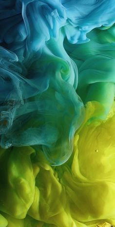 an abstract painting with blue, yellow and green colors in it's watercolors